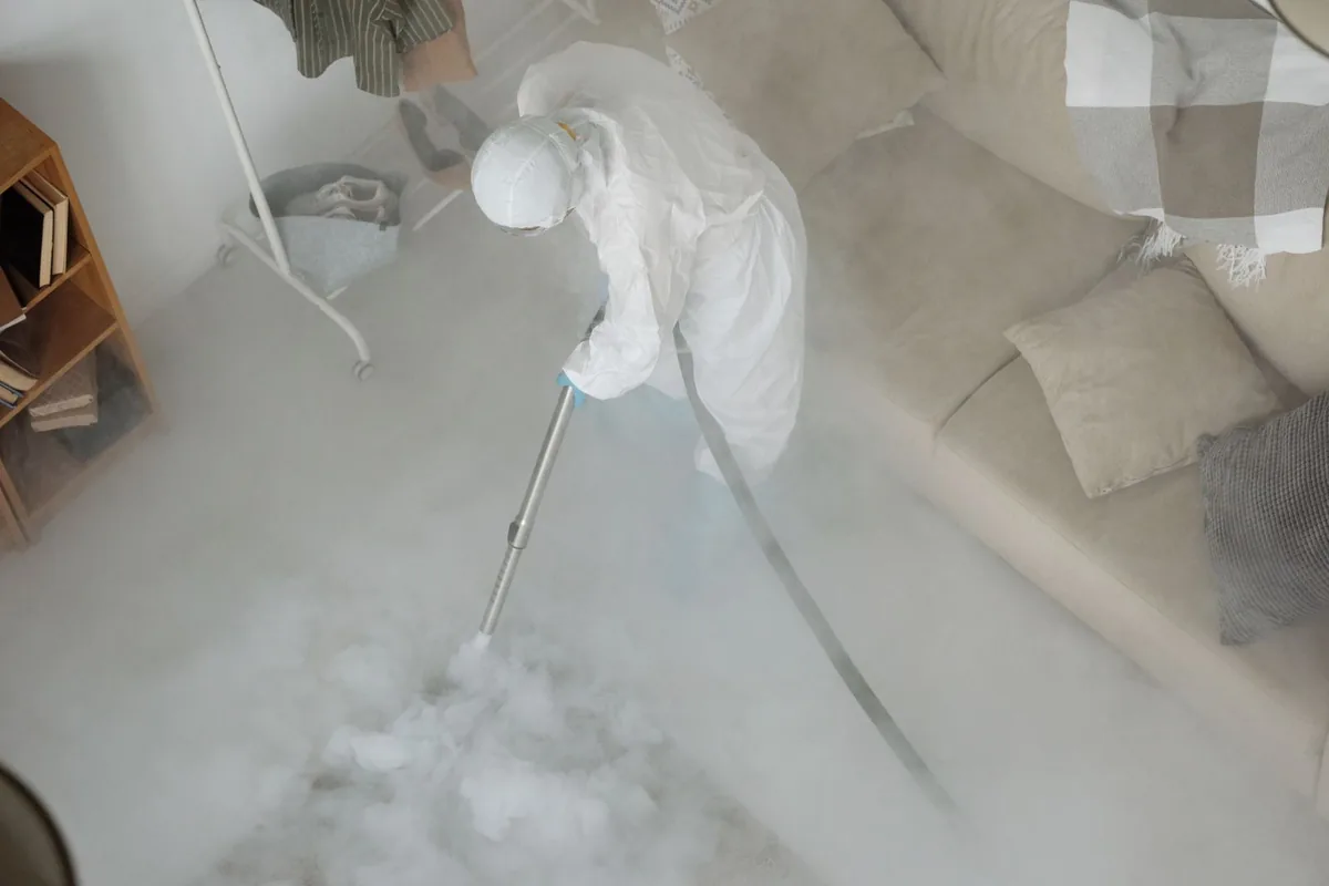 Biohazard cleanup technician in protective equipment, La Mirada, CA